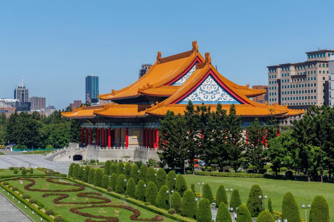 National Concert Hall in Taipei seen from above with formal patterned gardens and rows of manicured topiary in foreground
