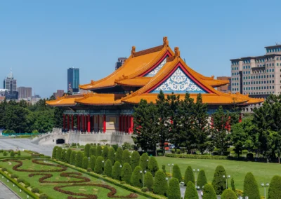 National Concert Hall in Taipei seen from above with formal patterned gardens and rows of manicured topiary in foreground