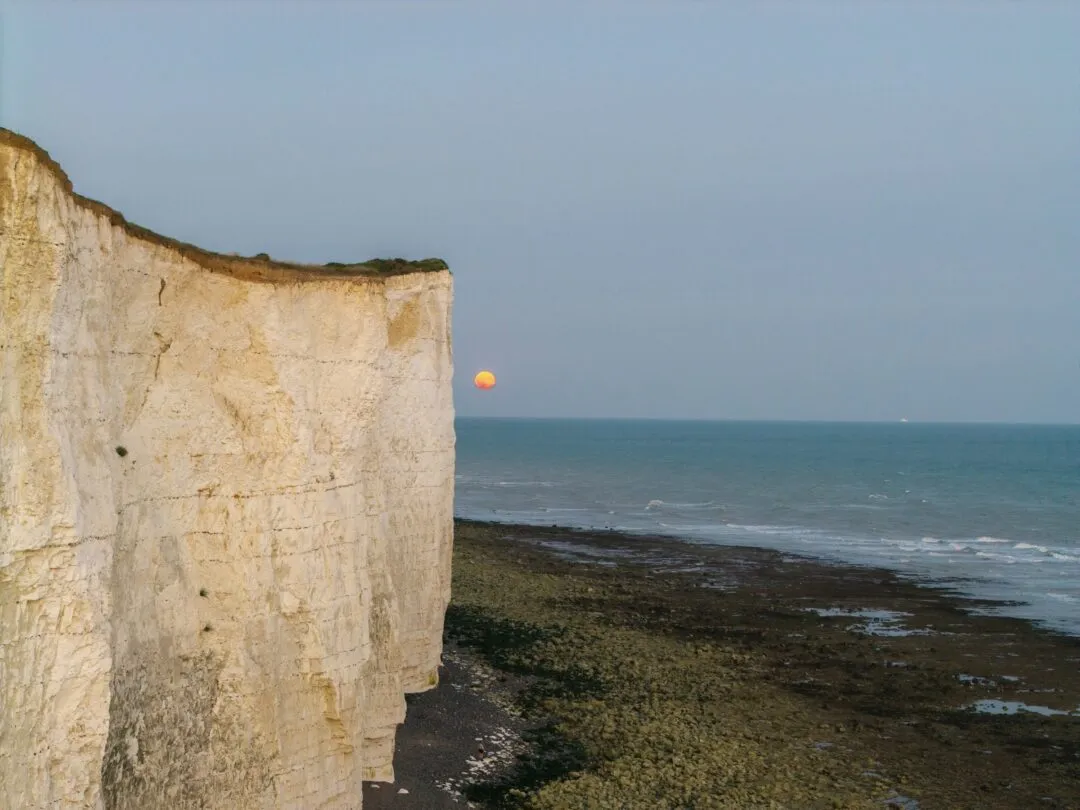 Beachy head aerial cliff face moon