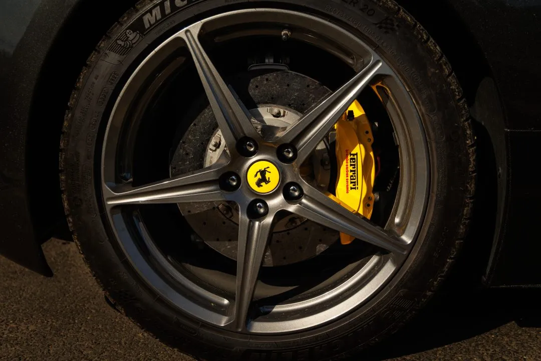 Ferrari black wheel side profile, Caffeine and Machine