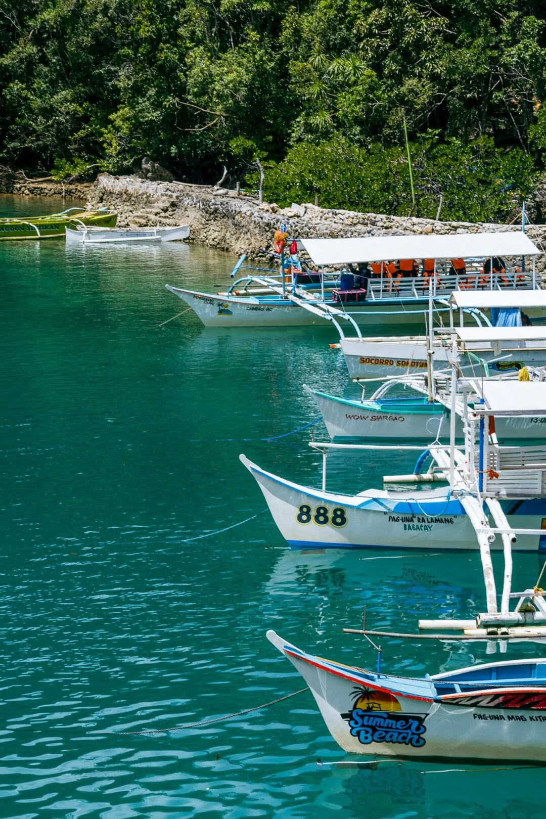Colourful row named local boats siargao