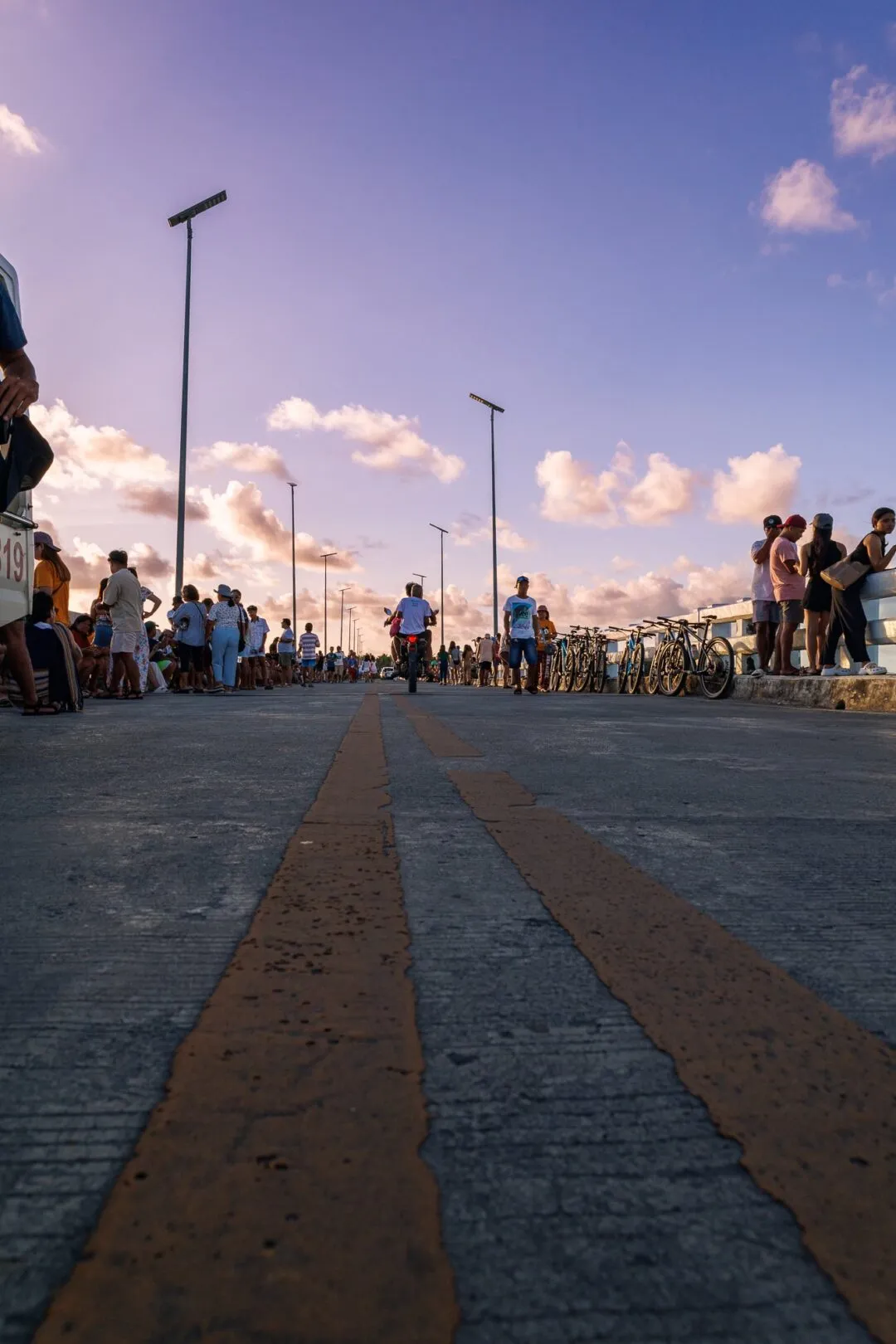 Crowded sunset boardwalk leading lines siargao