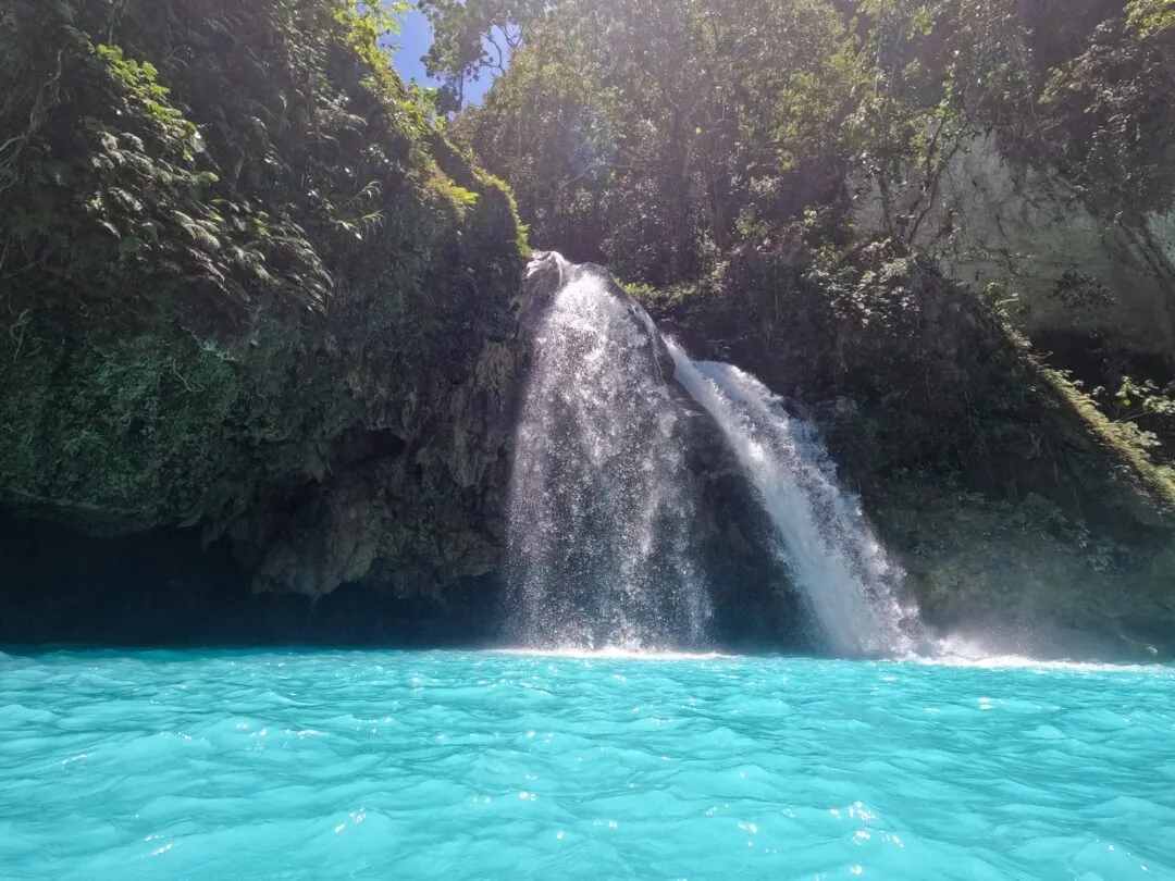 Dramatic close up twin falls turquoise pool cebu