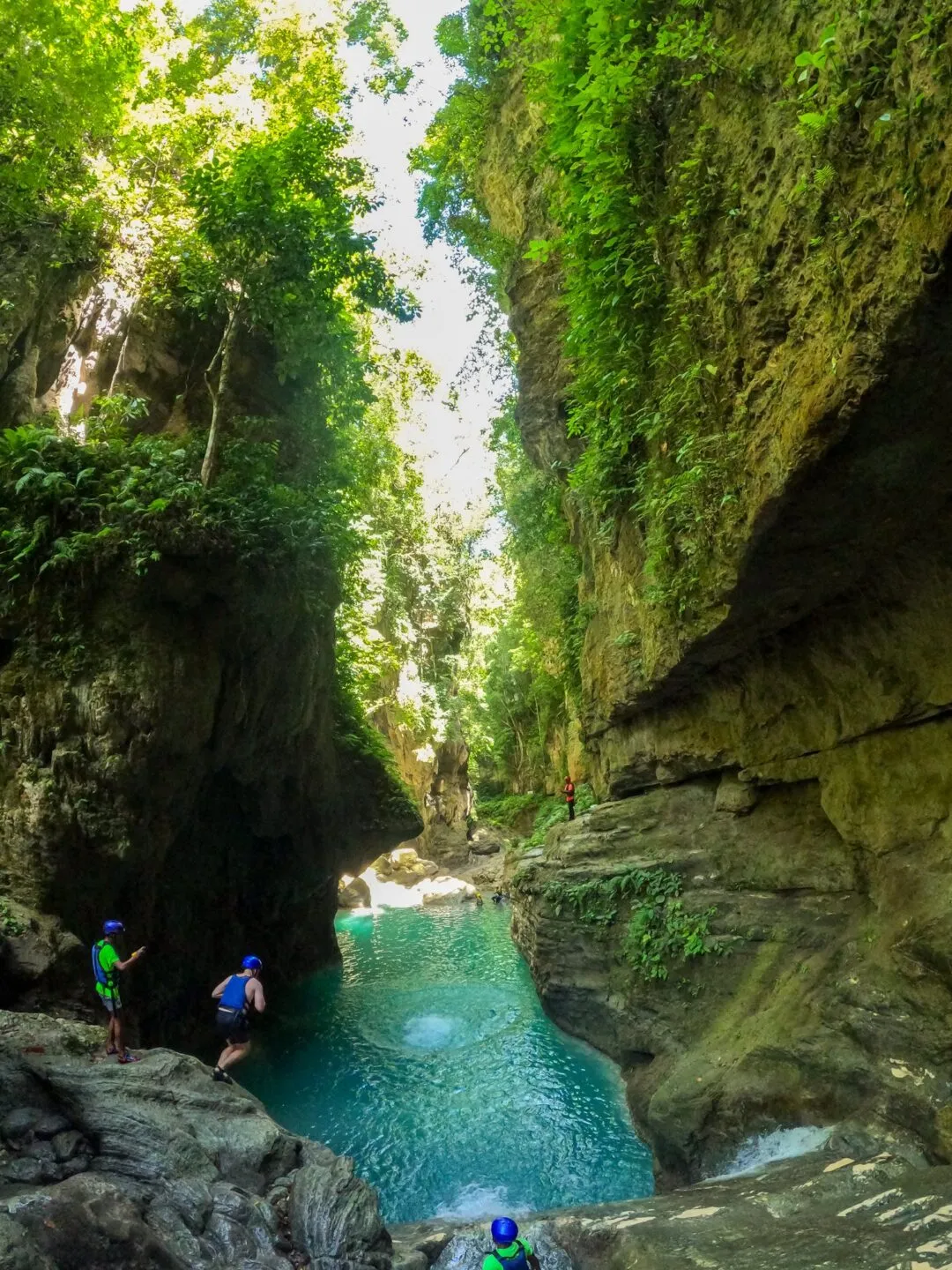 Dramatic vertical canyon climbers cliff edge cebu