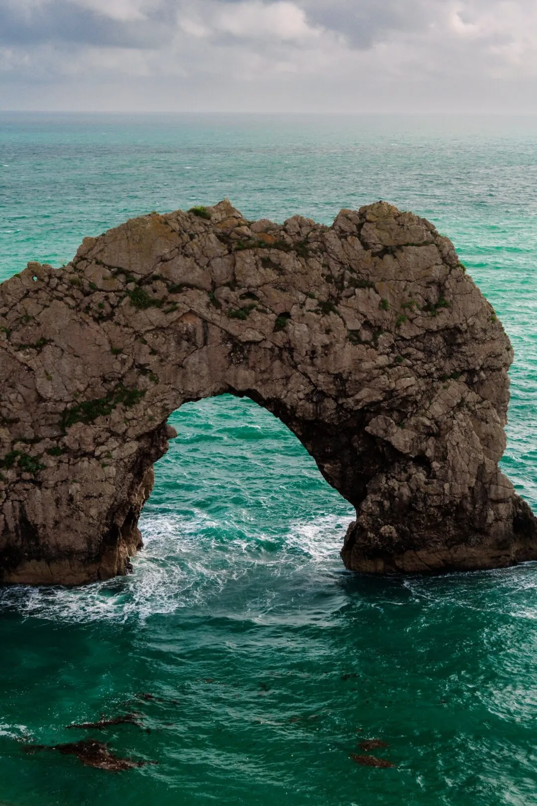 Durdle door arch clear water