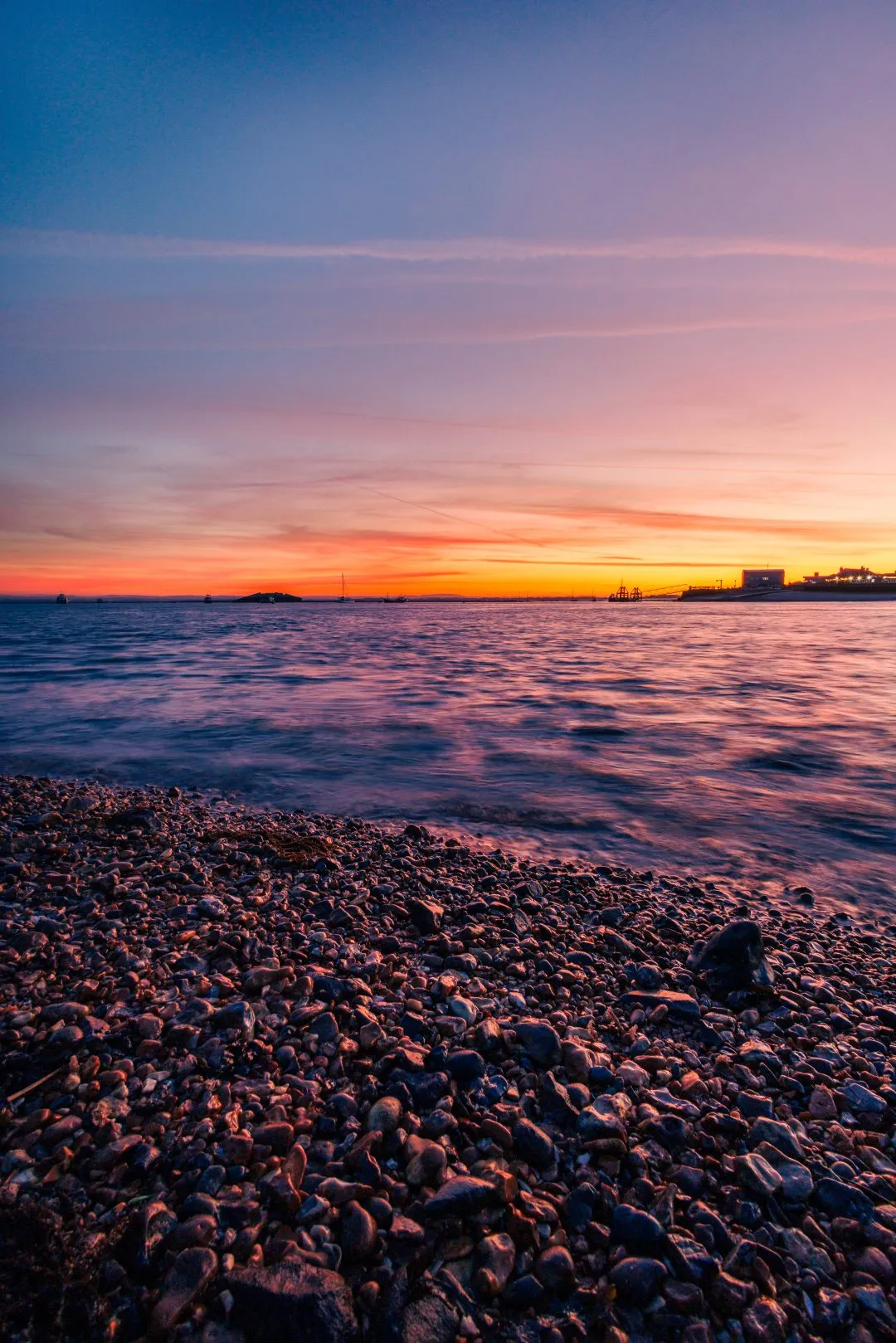 Harbour mouth pebble beach dusk, Eastney