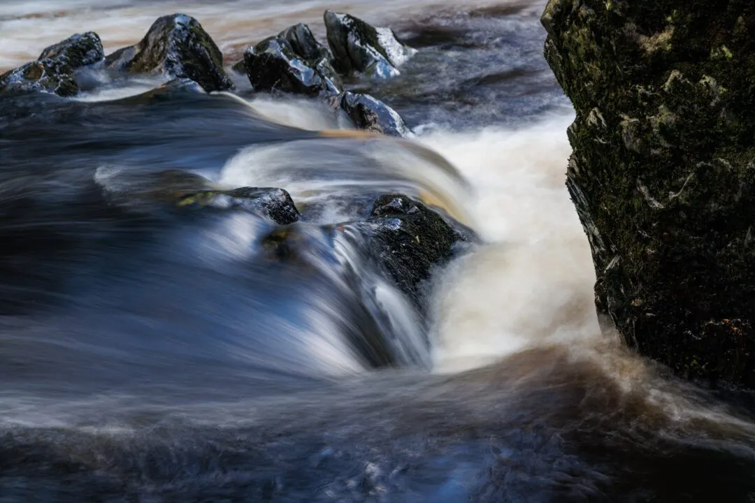 Fairy glen water rushing rocks