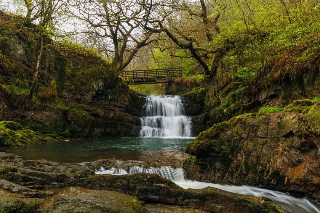 Four waterfalls footbridge view
