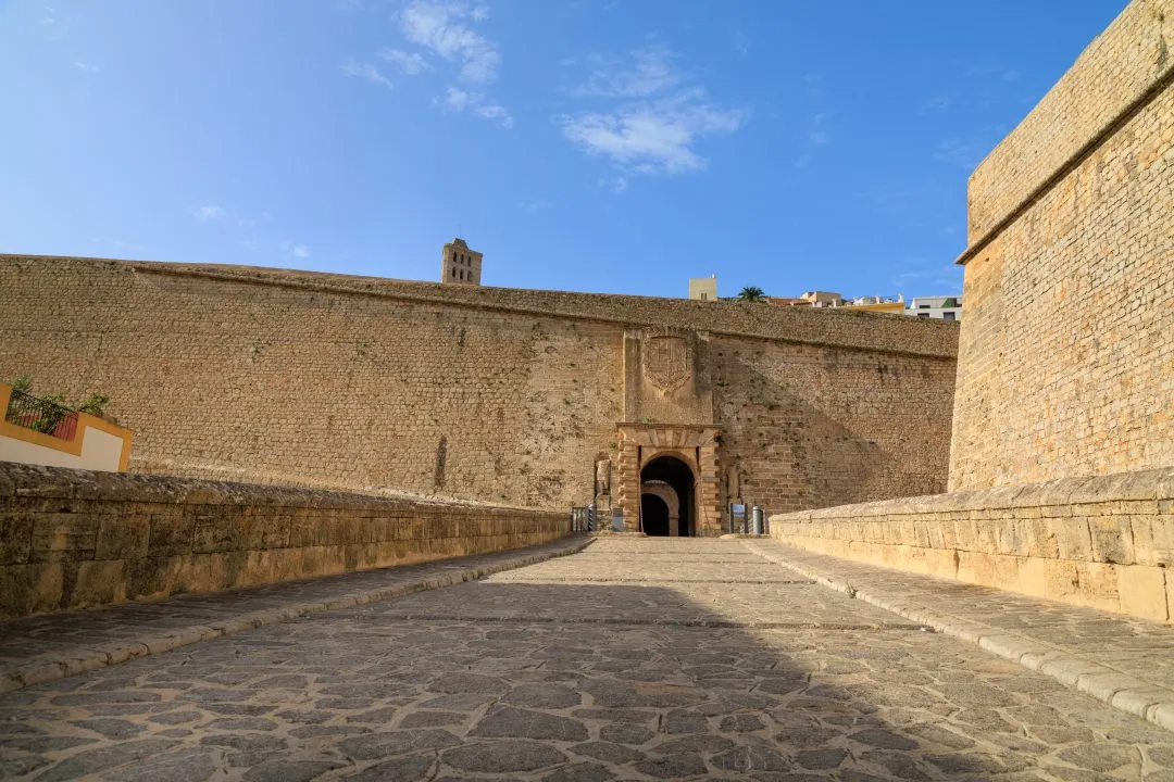 Fortress wall cathedral tower approach, Ibiza Old Town