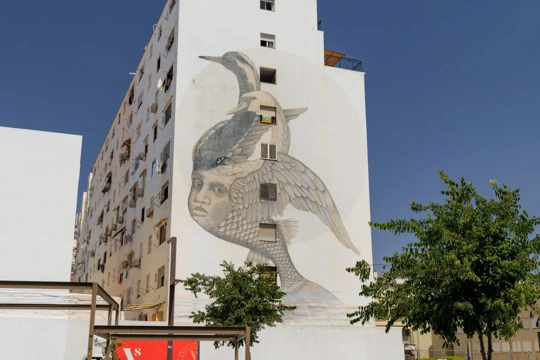 Street art mural bird face, Ibiza Old Town