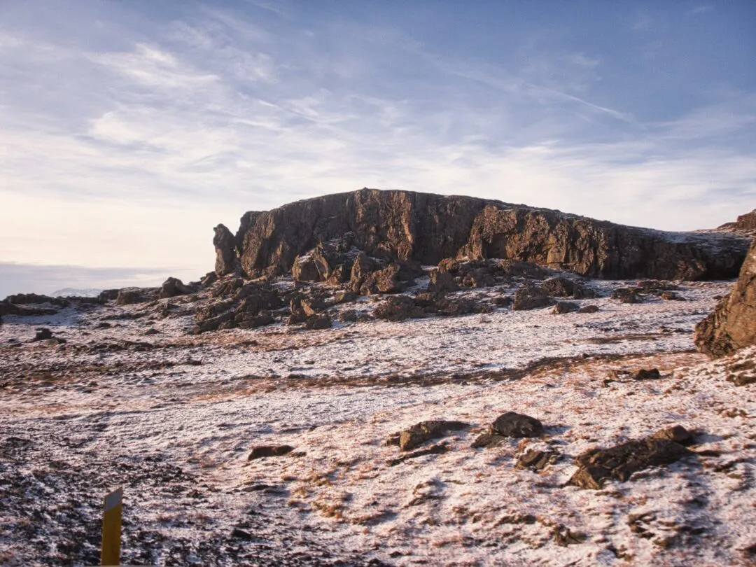 Iceland basalt cliff golden light