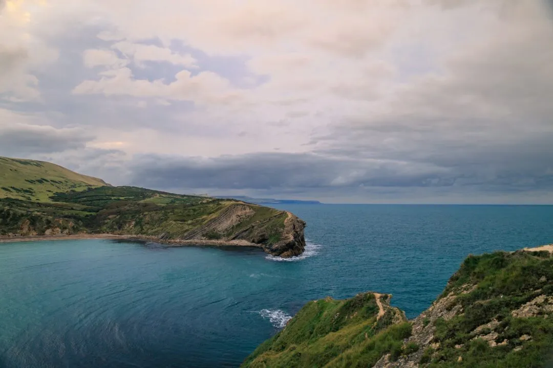 Lulworth cove aerial golden light