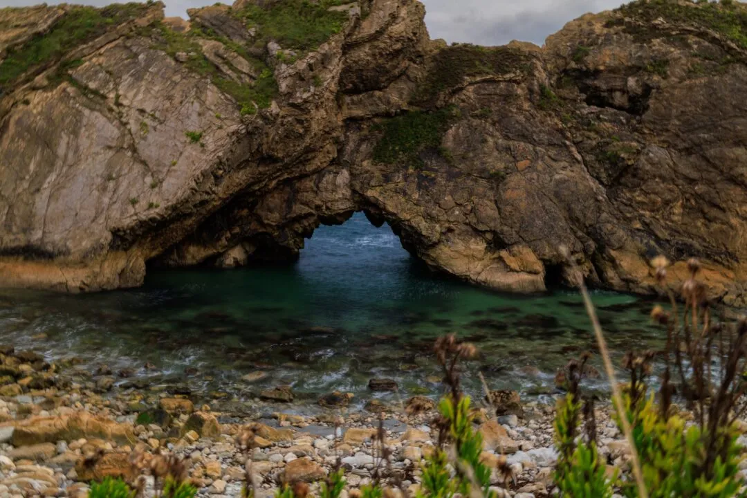 Lulworth cove arch turquoise water