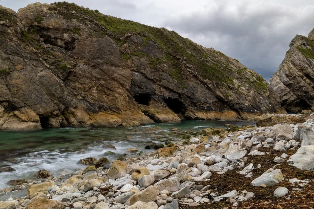Lulworth cove cave beach