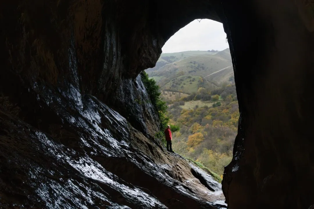 Peak district Thor's Cave hiker silhouette