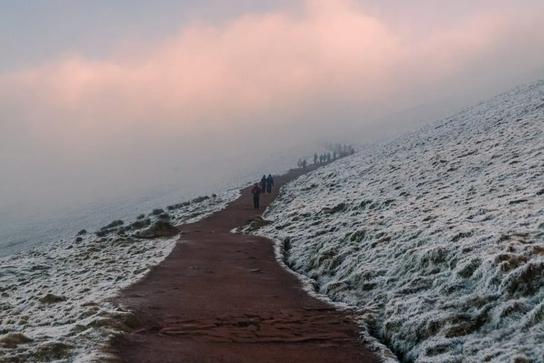 Pen y Fan hikers snowy ridge path