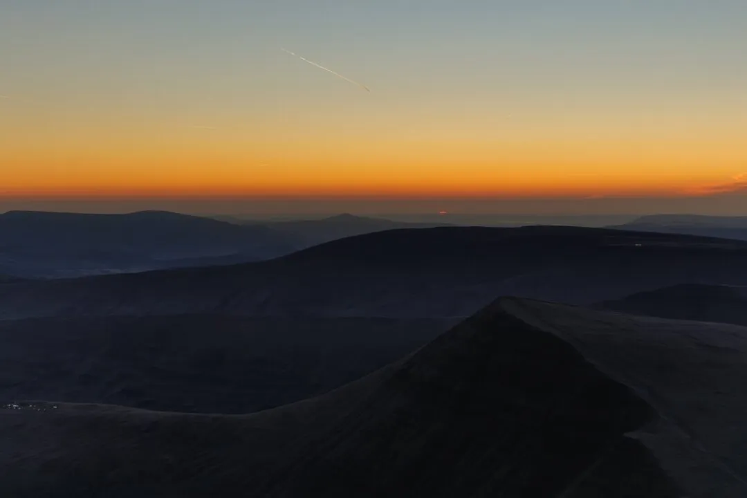 Pen y Fan silhouette orange horizon