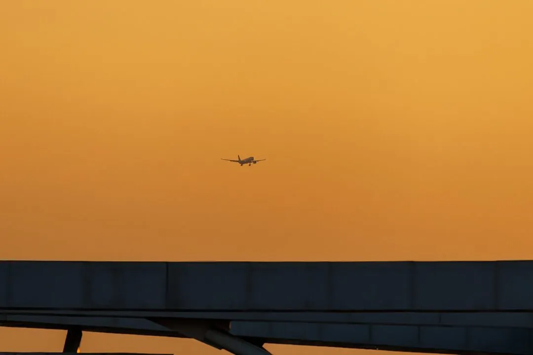 Plane silhouette elevated roadway manila