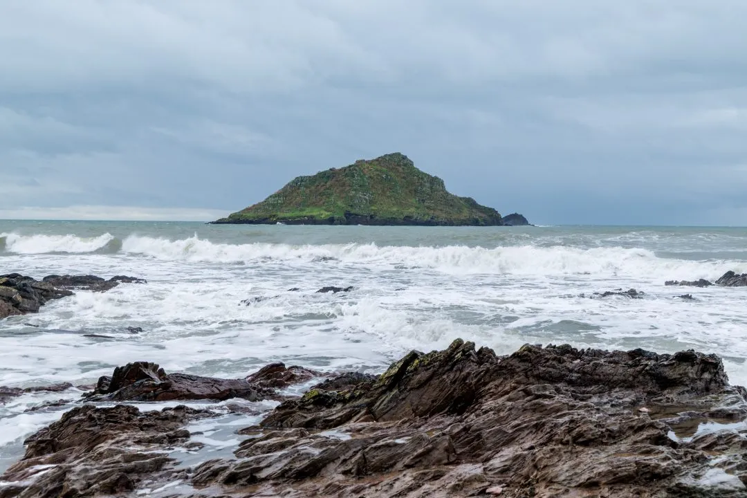 Wave breaking in front of Mew Stone, Wembury, Devon