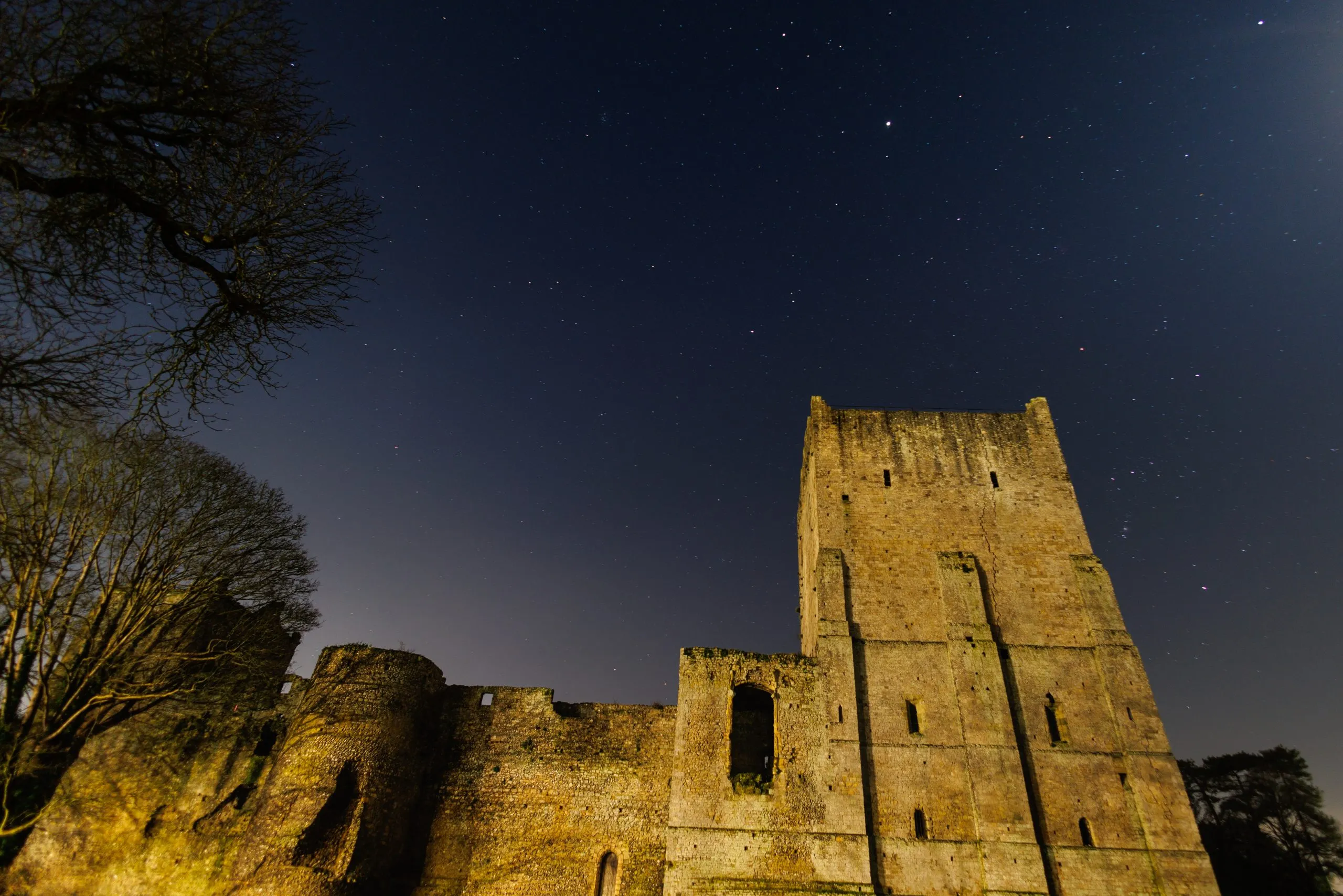 Castle keep light painted night sky, Portchester