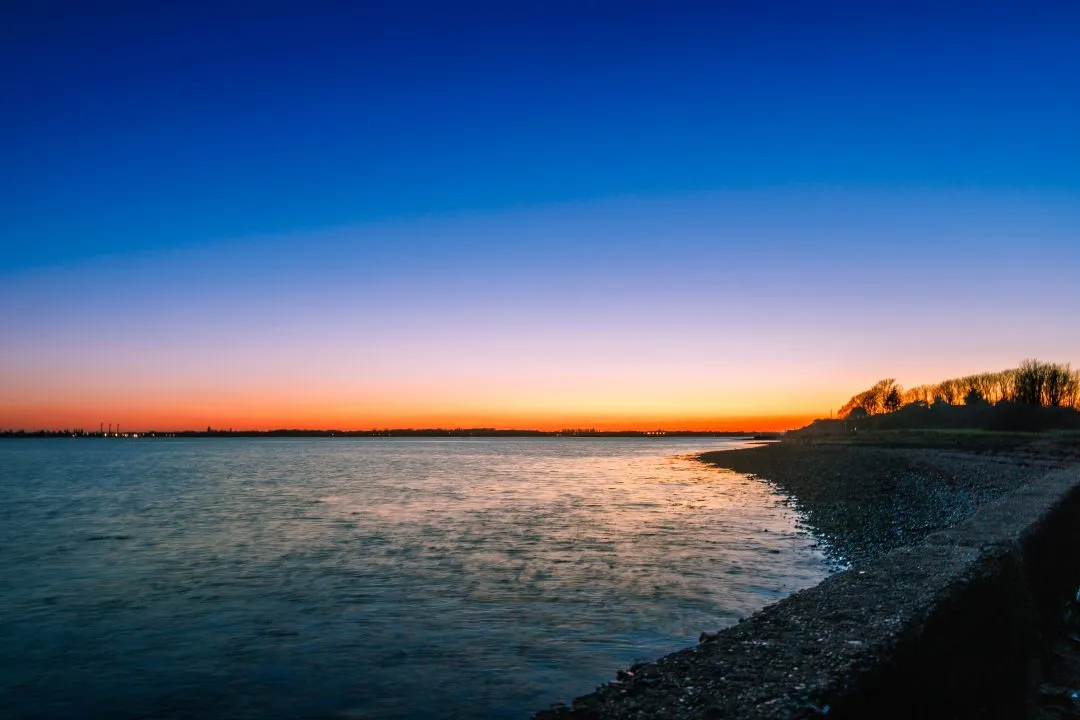 Harbour shoreline pebble beach sunset, Portchester