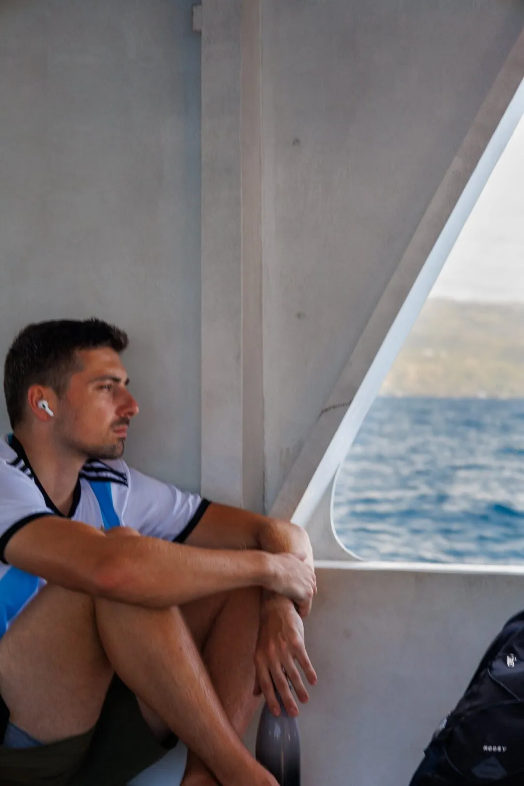 Portrait man framed boat window bohol