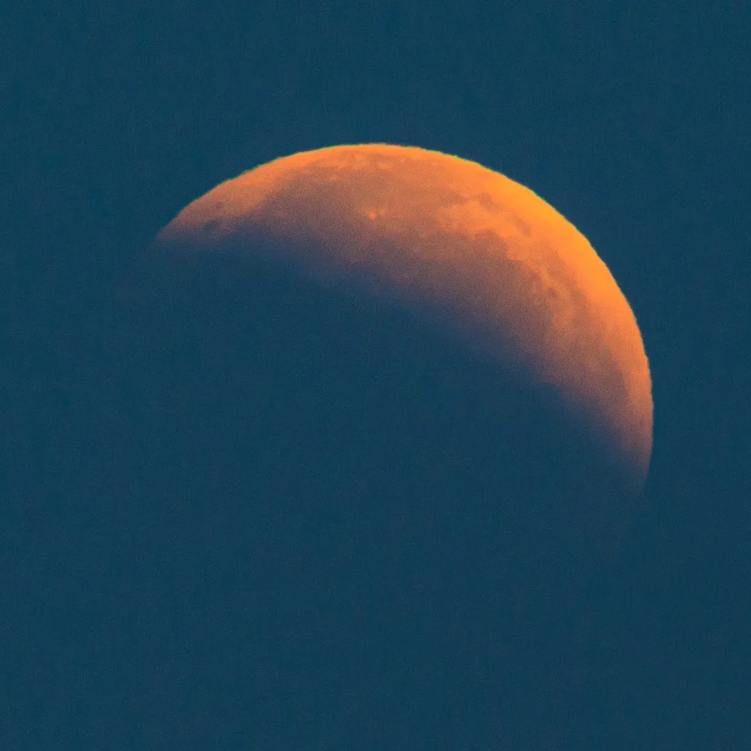 Lunar eclipse waning blue sky, Portsdown Hill