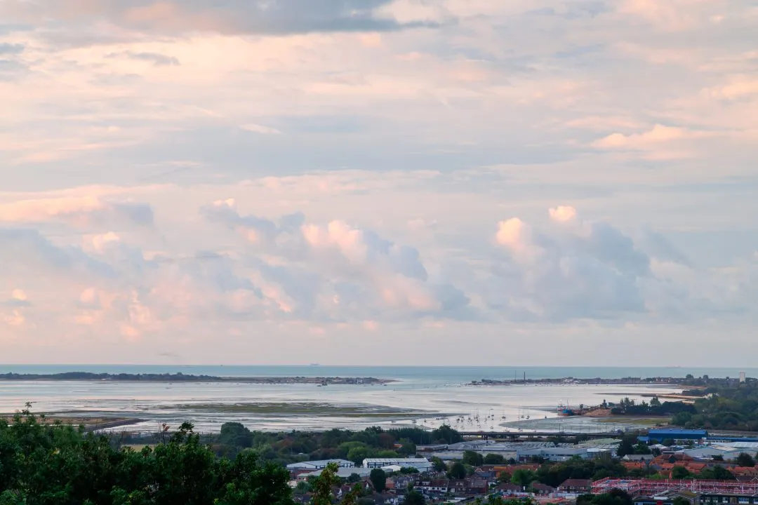 Sunset estuary industrial harbour, Portsdown Hill