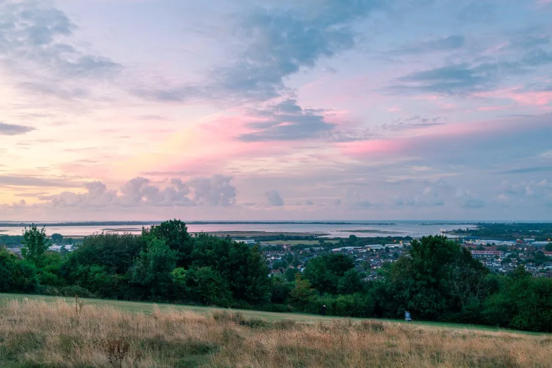 Sunset meadow harbour walkers, Portsdown Hill