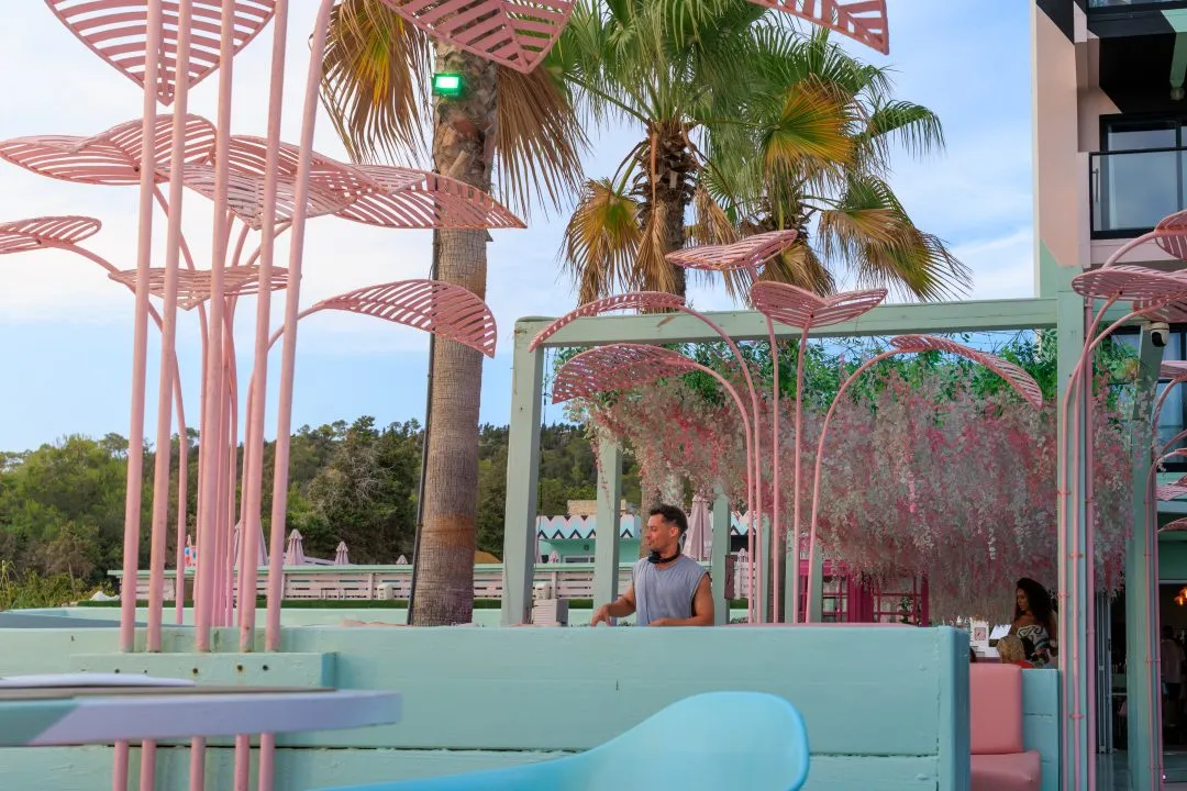 Pastel sunset bar decor bartender, San Antonio, Ibiza