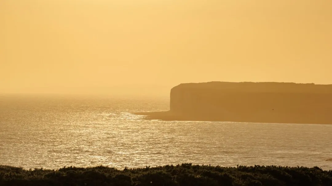 Seven sisters hazy sunset silhouette