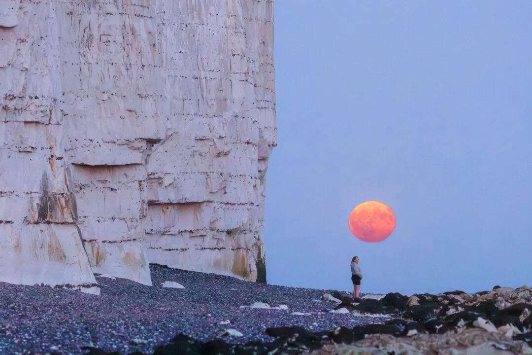 Seven sisters moonrise orange moon