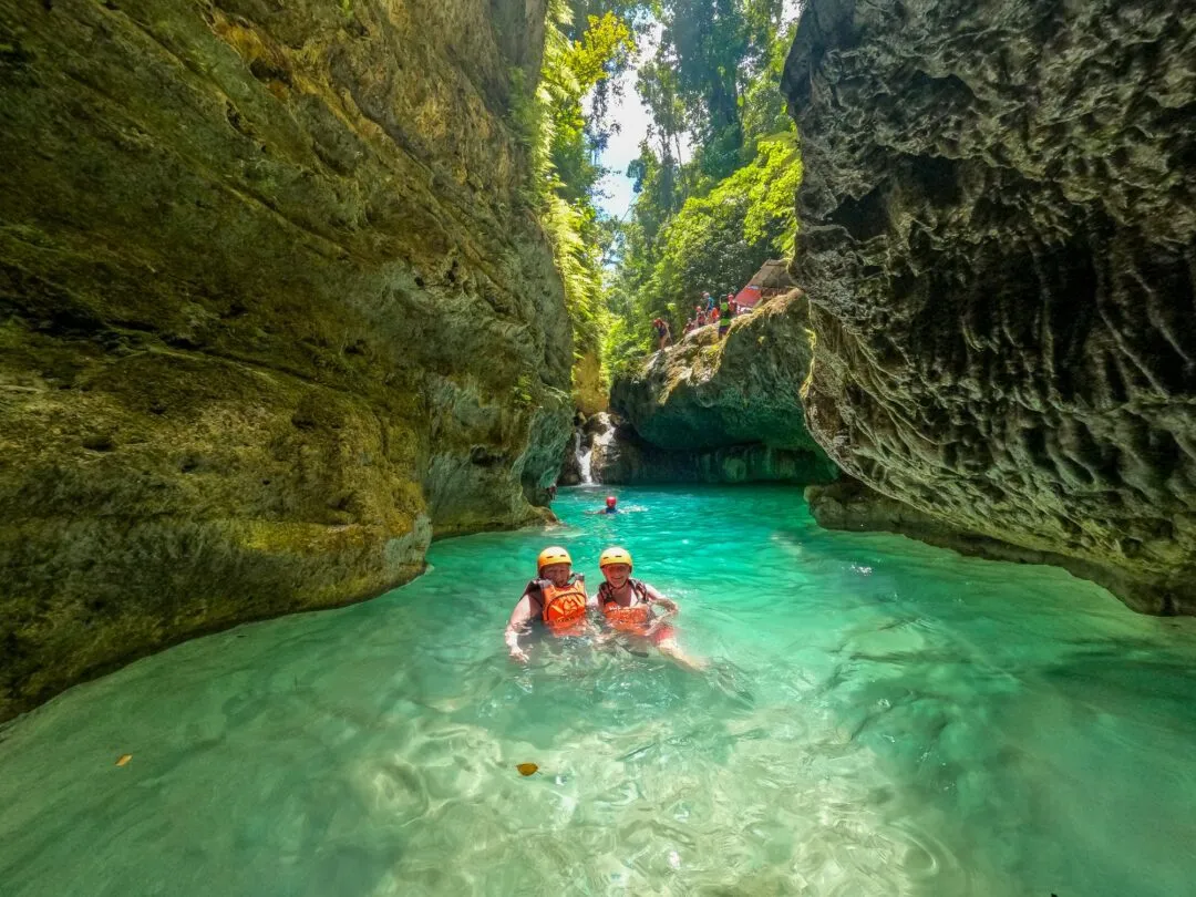 Swimming couple waterfall viewing platform cebu