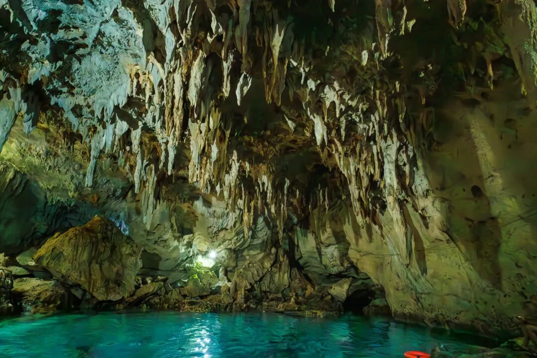 Turquoise cave pool stalactites bohol