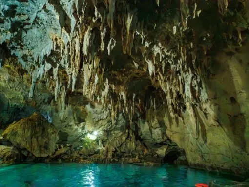 Turquoise cave pool stalactites bohol