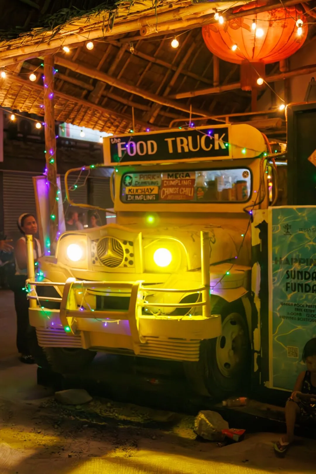 Vibrant food truck jeepney night festive El Nido