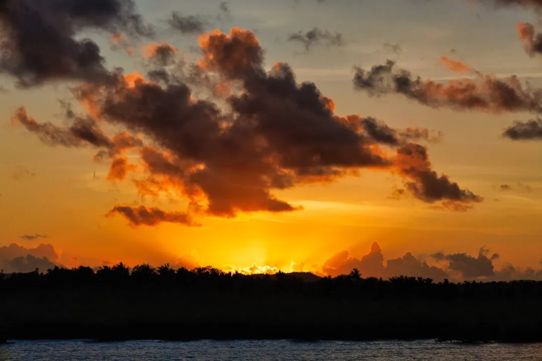 Vivid sunset cloud burst siargao