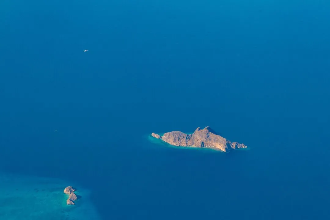 Warm toned aerial hero island El Nido