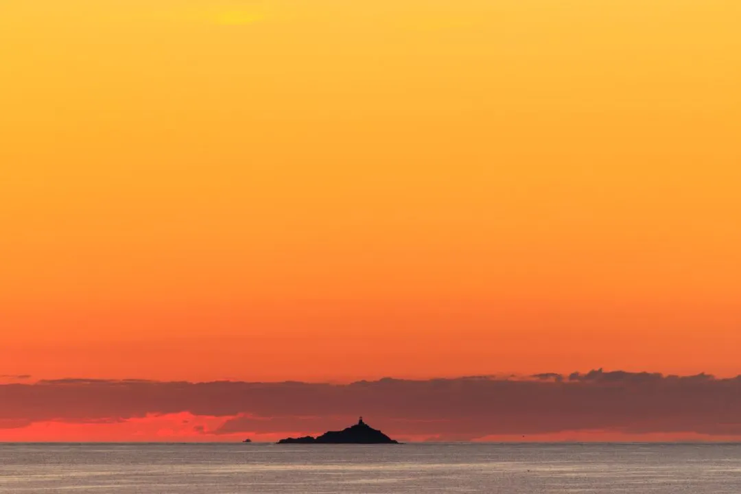 Lighthouse island silhouette red sky boat, West Hook Farm