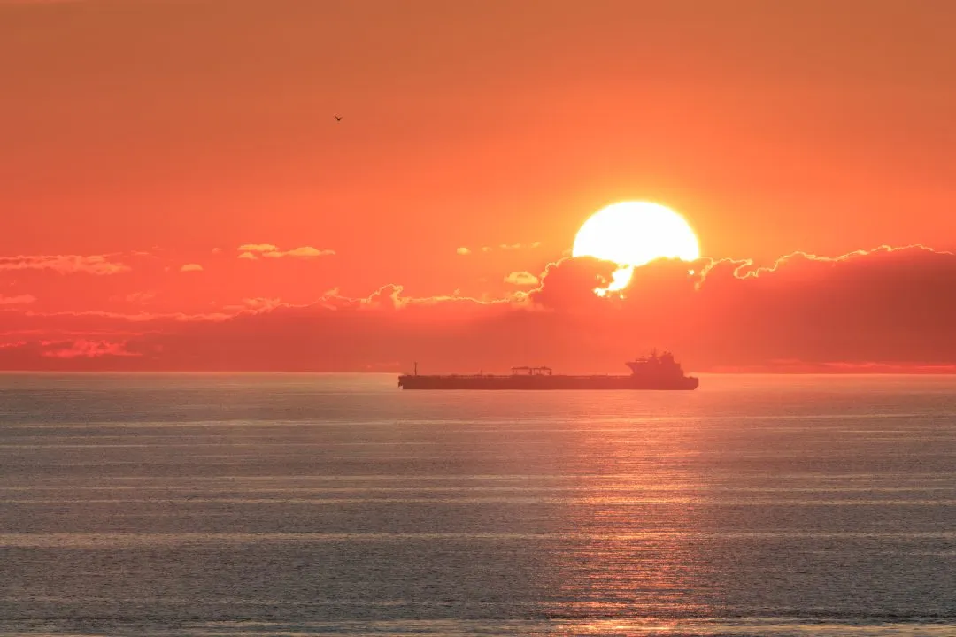 Sun above clouds tanker ship, West Hook Farm